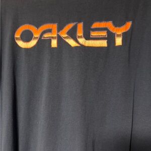 Oakley Black Tee with Vibrant Orange Logo